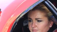 Erica Enders straps into her Pro Stock car during an action-packed Saturday at the NHRA Carolina Nationals.