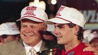 Speedway Motorsports, Inc. Executive Chairman O. Bruton Smith poses for a photo in Victory Lane with a young driver named Jeff Gordon, who had just captured his first Sprint Cup Series win at the 1994 Coca-Cola 600.