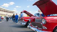 Cars lined up along the frontstretch during the Pennzoil AutoFair at Charlotte Motor Speedway.