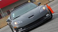 A late model Corvette takes a turn on the AutoCross course on All-American Sunday at the 22nd annual Goodguys Southeastern Nationals at Charlotte Motor Speedway.