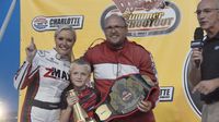 Rocky River Church's Donnie Icenhour celebrates winning the Faster Pastor School Bus Slobberknocker during Round 6 of the Bojangles' Summer Shootout at Charlotte Motor Speedway.