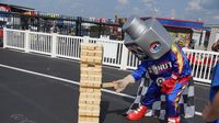 LugNut making the most of a new "Giant Jenga" Play Zone attraction during Day 2 of the Pennzoil AutoFair presented by Advance Auto Parts.