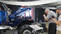 Fans take photos of a Jeep Renegade on display in the Nationwide Showcase Pavilion during Day 2 of the Charlotte AutoFair at Charlotte Motor Speedway.