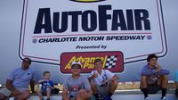 Fans take a break from the show and find some shade in Victory Lane during a busy Saturday at the Pennzoil AutoFair presented by Advance Auto Parts.