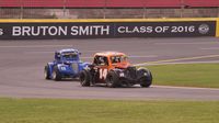 Akinori Ogata leads Danny Cisson through Turn 2 during Round 6 of the Bojangles' Summer Shootout at Charlotte Motor Speedway.