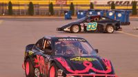 Matthew Davey pulls out of the garage before his heat race during Round 6 of the Bojangles' Summer Shootout at Charlotte Motor Speedway.