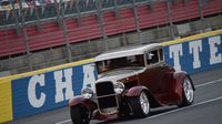 Hundreds of hot rods took to the track for the annual Saturday night cruise under the lights during the second day of the Goodguys Southeastern Nationals at Charlotte Motor Speedway.