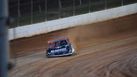 Jonathan Davenport kicks up a little dust racing through Turn 2 during a test session at The Dirt Track at Charlotte ahead of the Nov. 5-7 Bad Boy Buggies World of Outlaw World Finals.