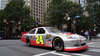 The iconic No. 24 car of Jeff Gordon made its laps around Center City Charlotte during a Laps Around Uptown event in Center City Charlotte Monday to kick off race week at Charlotte Motor Speedway.