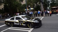 Fans lined the streets during a Laps Around Uptown event in Center City Charlotte Monday to kick off race week at Charlotte Motor Speedway.