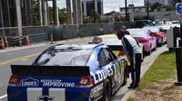 A race fans gets an up close view of the No. 48 Chevrolet of Jimmie Johnson during a Laps Around Uptown event in Center City Charlotte Monday to kick off race week at Charlotte Motor Speedway.