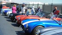 Cars sit near pit road during the Pennzoil AutoFair at Charlotte Motor Speedway.