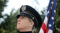 A member of the Waynesville Police Department Honor Guard during opening ceremonies for the 6th annual Laps for Life event at Charlotte Motor Speedway.