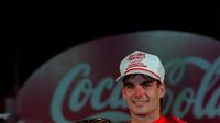 Jeff Gordon poses for a photo with the Bruton Smith trophy following his first-ever victory in Sprint Cup Series competition.