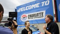 Hunter Hayes talks to media before taking a Rusty Wallace Racing Experience ride along at Charlotte Motor Speedway on Friday, Aug. 7, 2015. Hayes will return to the famed speedway on Saturday, Oct. 10, 2015, to perform before the Bank of America 500.