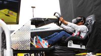 A young fan tests his driving prowess in the Pennzoil simulator during an action-packed Friday of fun at the Pennzoil AutoFair presented by Advance Auto Parts.