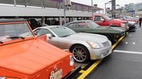 A wide array of vehicles representing the diversity found at AutoFair, are parked along pit road Sunday at AutoFair.