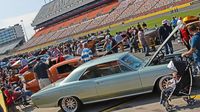 Cars line pit road during the second day of the Goodguys Southeastern Nationals at Charlotte Motor Speedway.
