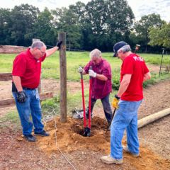 Charlotte Motor Speedway employees refreshed landscaping, power-washed, built a fence and tackled other needed projects at Wings of Eagles during its Day of Service 2022.