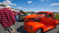 A visitor checks out a classic pickup truck during Friday's action at the Pennzoil AutoFair at Charlotte Motor Speedway.