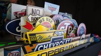 A collection of memorabilia for sale courtesy of the Petty Museum sits on display during the final day of the Pennzoil AutoFair at Charlotte Motor Speedway.