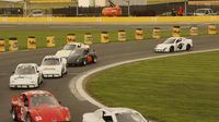 Bandolero drivers race through Turn 4 during Round 8 of the Bojangles' Summer Shootout at Charlotte Motor Speedway.