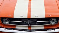 Racing stripes adorn the hood of this Ford Mustang during opening day at the Charlotte AutoFair.