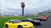 Candy-colored cars and trucks lined the 1.5-mile superspeedway during opening day at the Charlotte AutoFair.