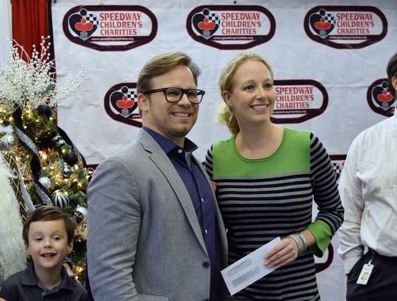 Speedway Children's Charities President Marcus Smith helps distribute more than $745,000 in grants at the Charlotte chapter's annual distribution event Wed., Dec. 9 at Charlotte Motor Speedway