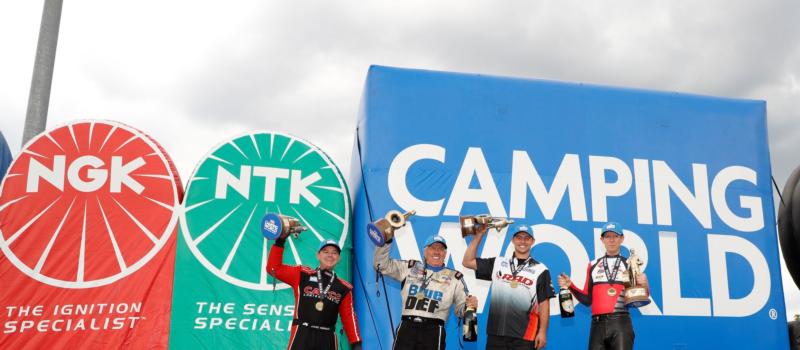 Steve Torrence (Top Fuel), John Force (Funny Car), Dallas Glenn (Pro Stock) and Steve Johnson (Pro Stock Motorcycle) celebrate their wins after a historic NGK NTK NHRA Four-Wide Nationals at zMAX Dragway on Sunday. 